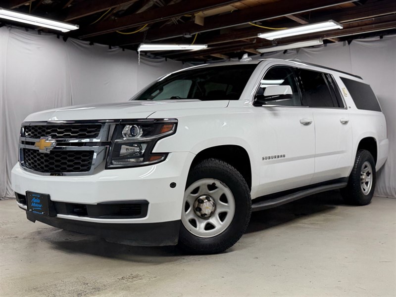 White 2015 Chevrolet Suburban SUV / Crossover Four-Wheel Drive 6-Speed Automatic