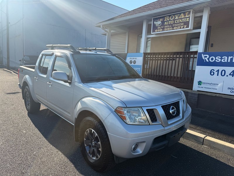 Brilliant Silver 2015 Nissan Frontier Pickup Truck Four-Wheel Drive 5-Speed Automatic