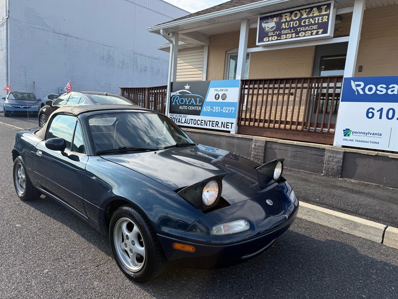 Blue 1997 Mazda MX-5 Miata Convertible 5-Speed Manual