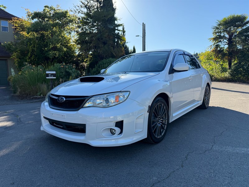 Satin White Pearl 2012 Subaru Impreza WRX Base Sedan All-Wheel Drive 5-Speed Manual
