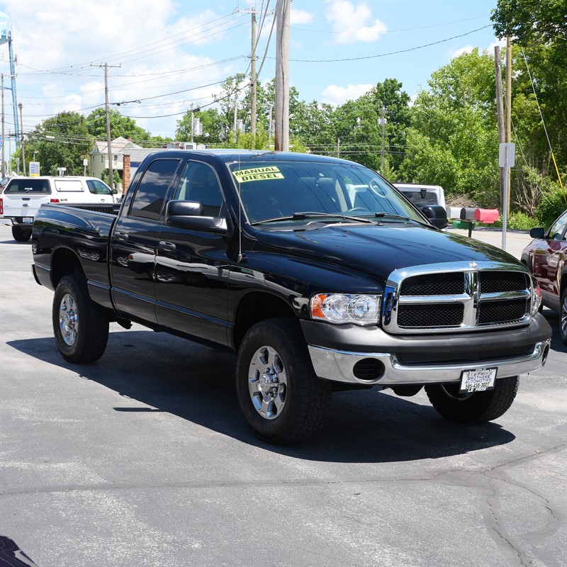Black 2005 Dodge RAM 2500 ST Quad Cab 4WD Pickup Truck Four-Wheel Drive 6-Speed Manual