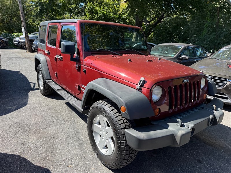 Red Rock Crystal Pearl with Black Hard Top 2010 Jeep Wrangler SUV / Crossover Four-Wheel Drive 4-Speed Automatic