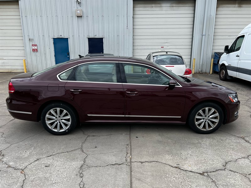 Opera Red Metallic 2012 Volkswagen Passat Sedan Front-Wheel Drive Automatic